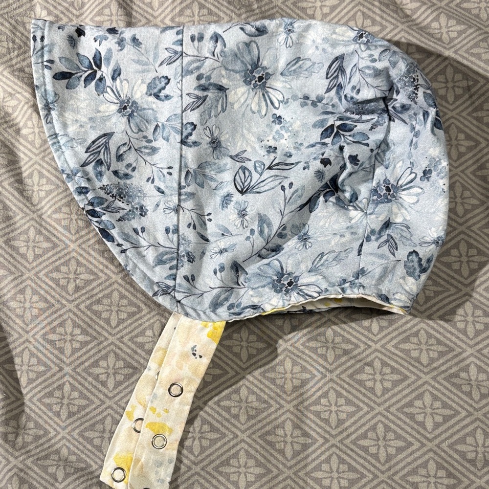 Urban baby bonnet reversible organic cotton bonnet in blue/ yellow